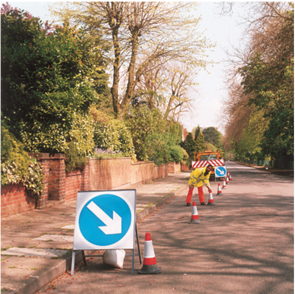 Man placing cones