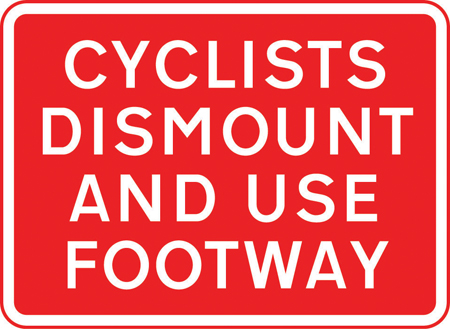 Cyclists dismount sign